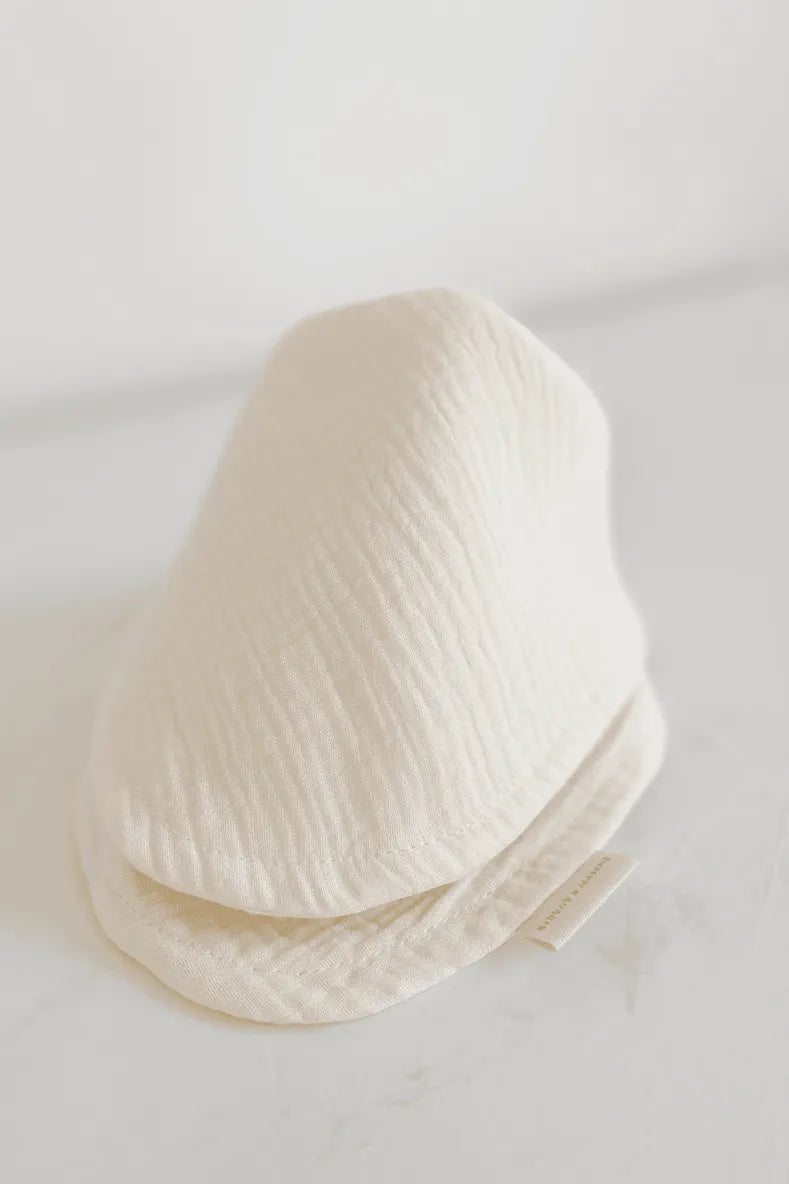 Lux_Muslin_Baby_Bib_Ivory on a white background