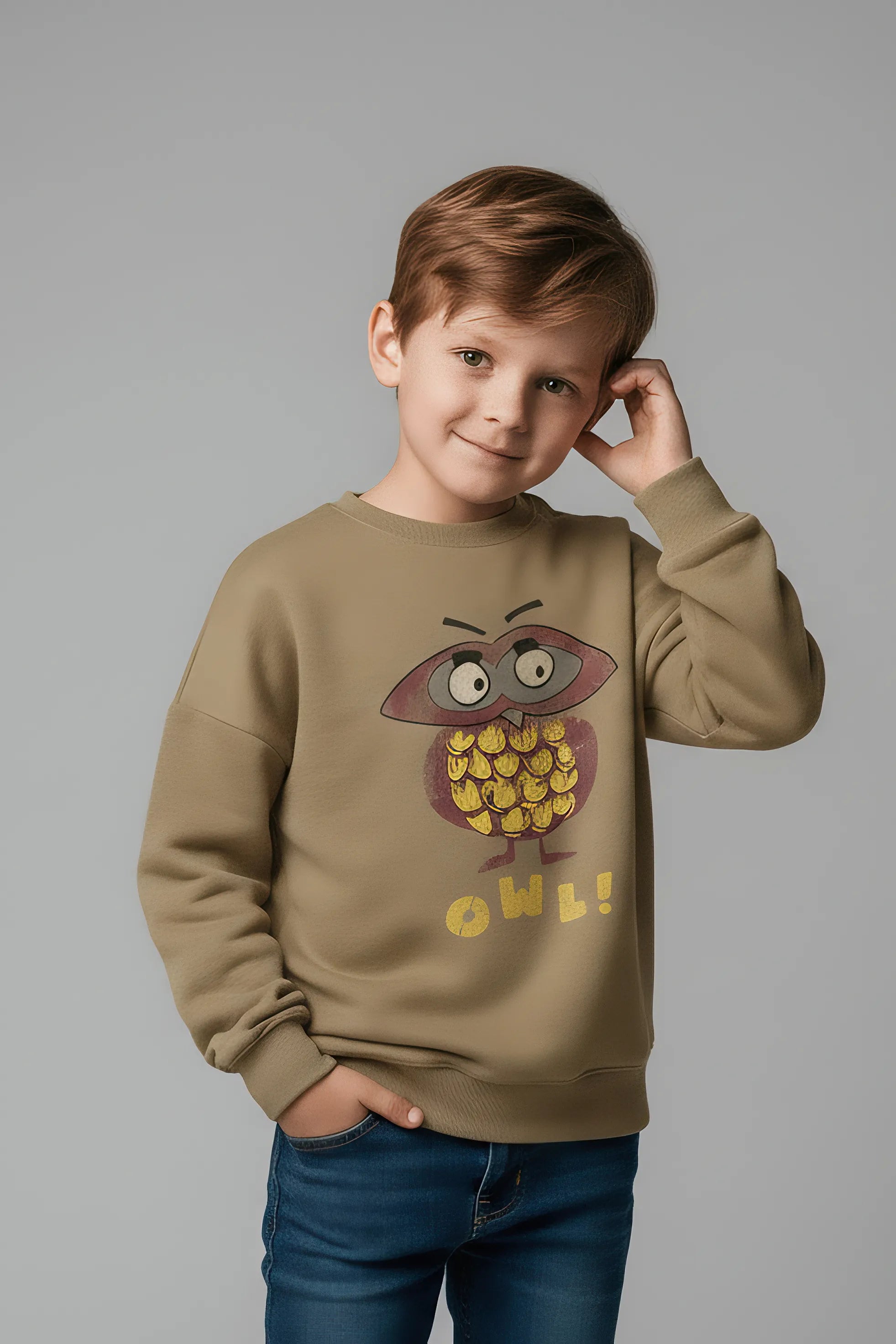 Child wearing a Bubba's and Mama's sweatshirt with an owl design on a gray background