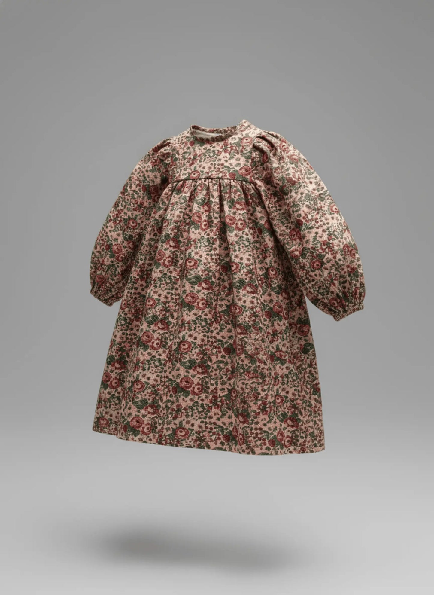 Floral patterned dress on a gray background