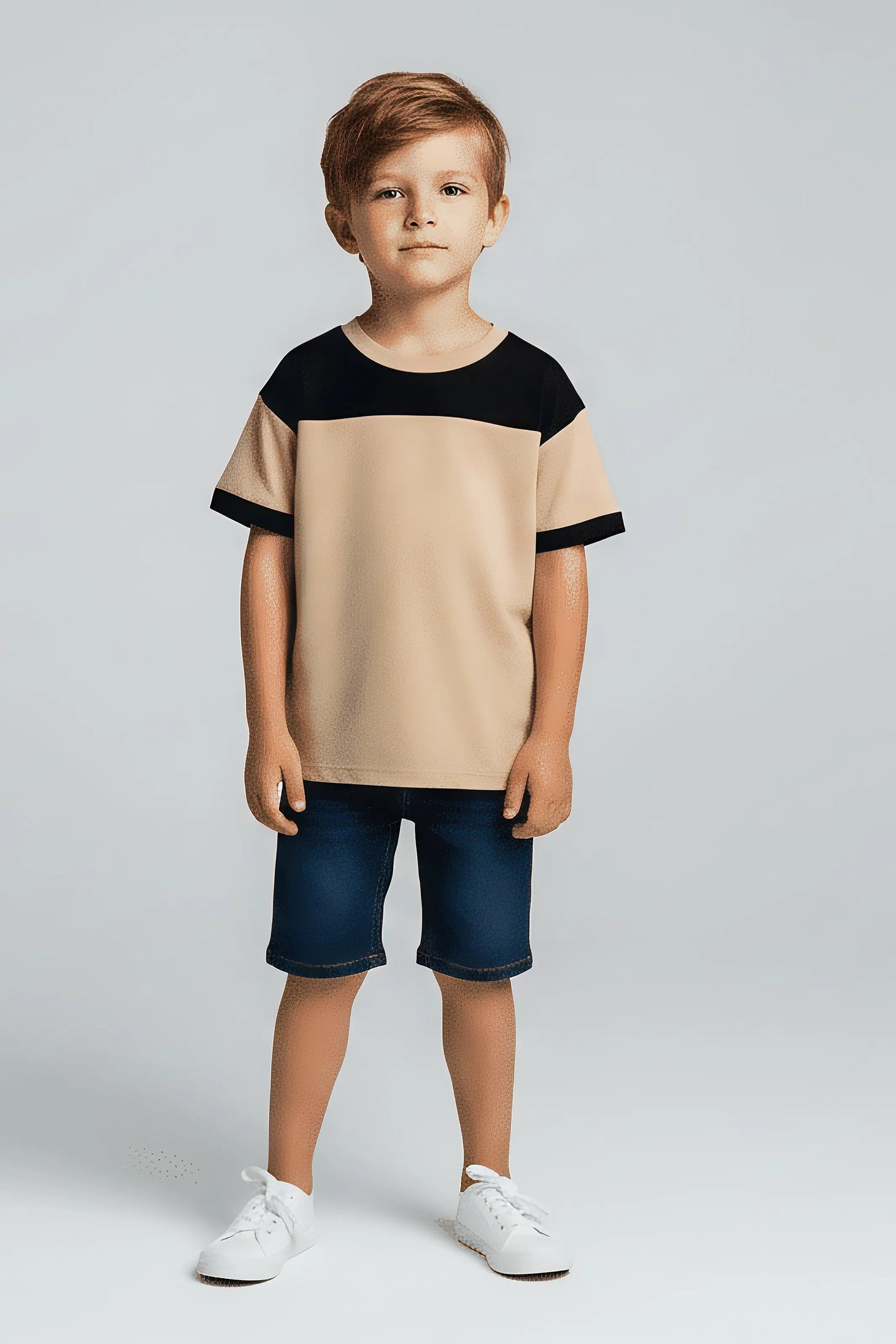 Child wearing a Bubba's and Mama's beige and black shirt with blue shorts on a white background