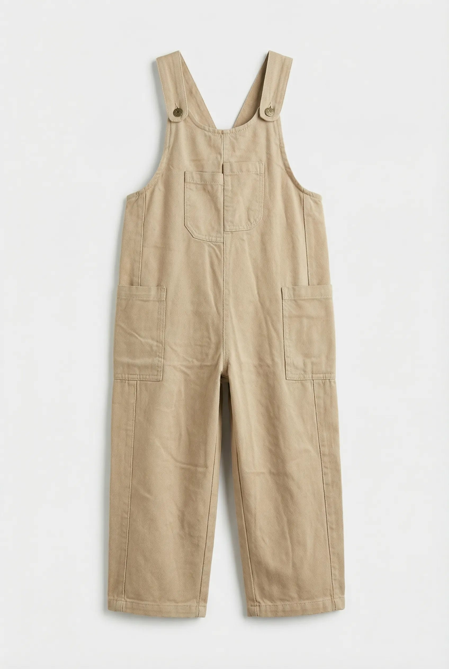 Beige overalls on a white background