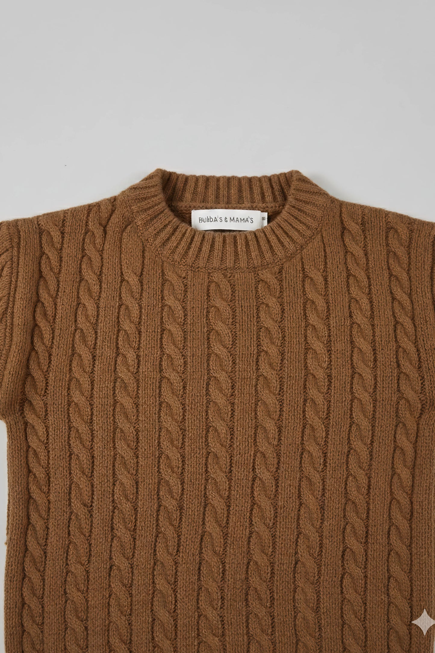 Brown cable knit Bubba's and Mama's sweater on a light gray background