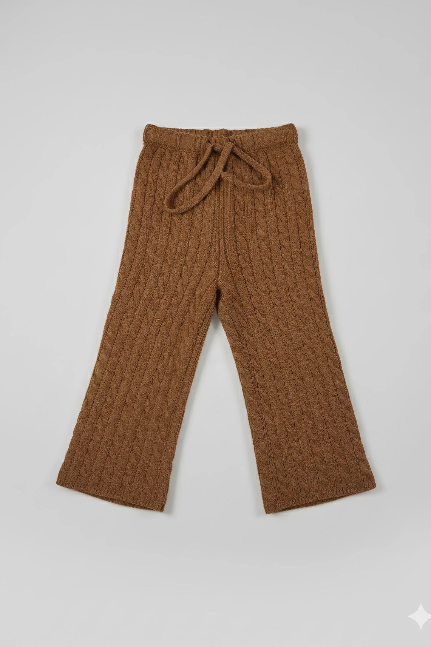 Brown cable knit Bubba's and Mama's pants on a light gray background