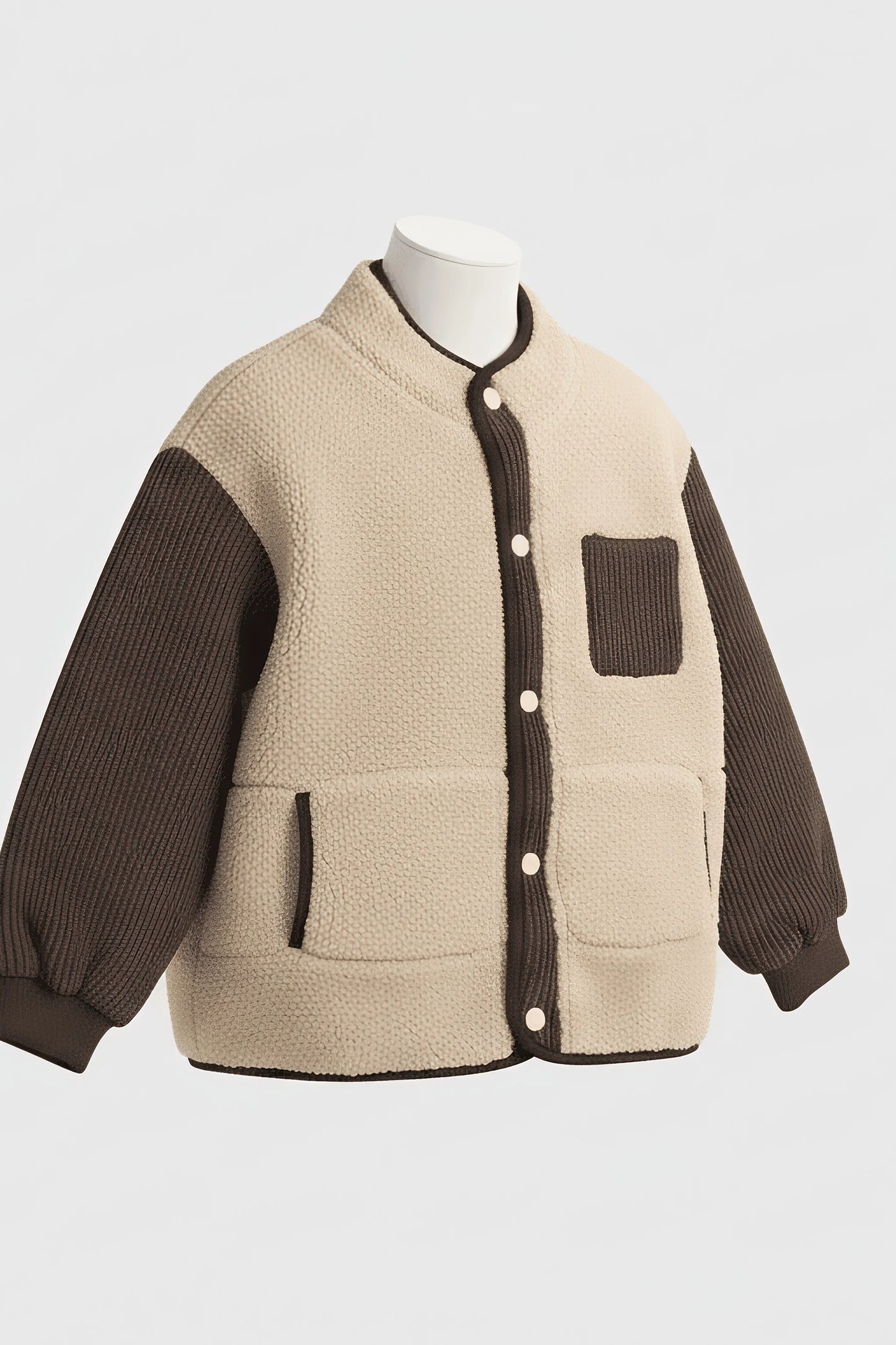 Two-tone Bubba's and Mama's jacket with beige front and brown sleeves and sides on a mannequin against a white background.