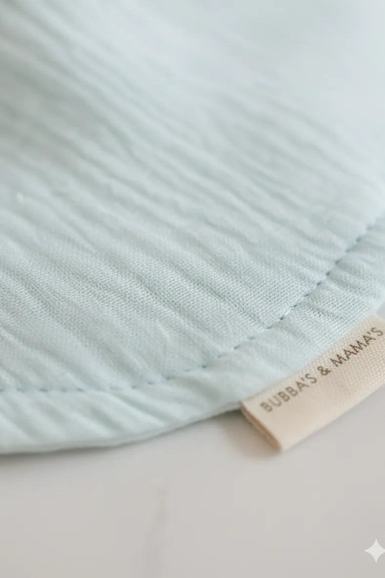 Light blue fabric with a 'Bubbas & Mamas' label on a white background