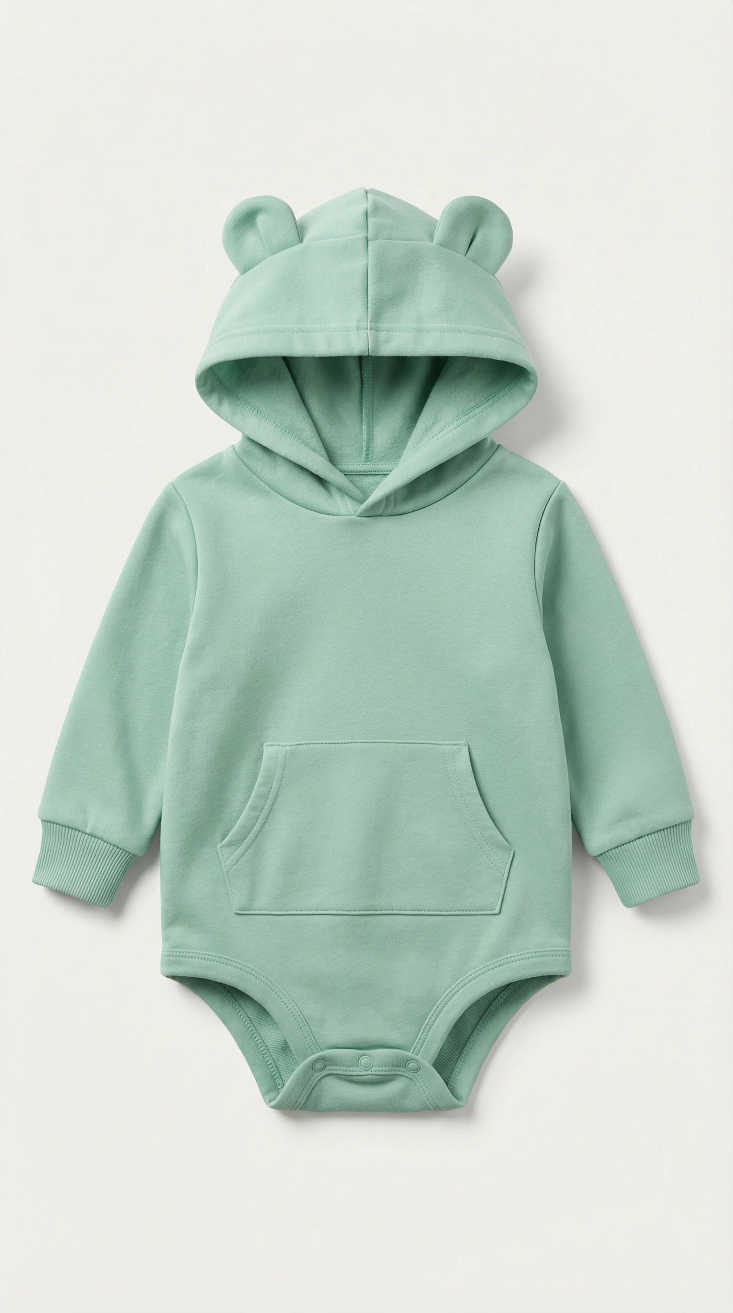 Mint green baby hoodie with bear ears on a light gray background