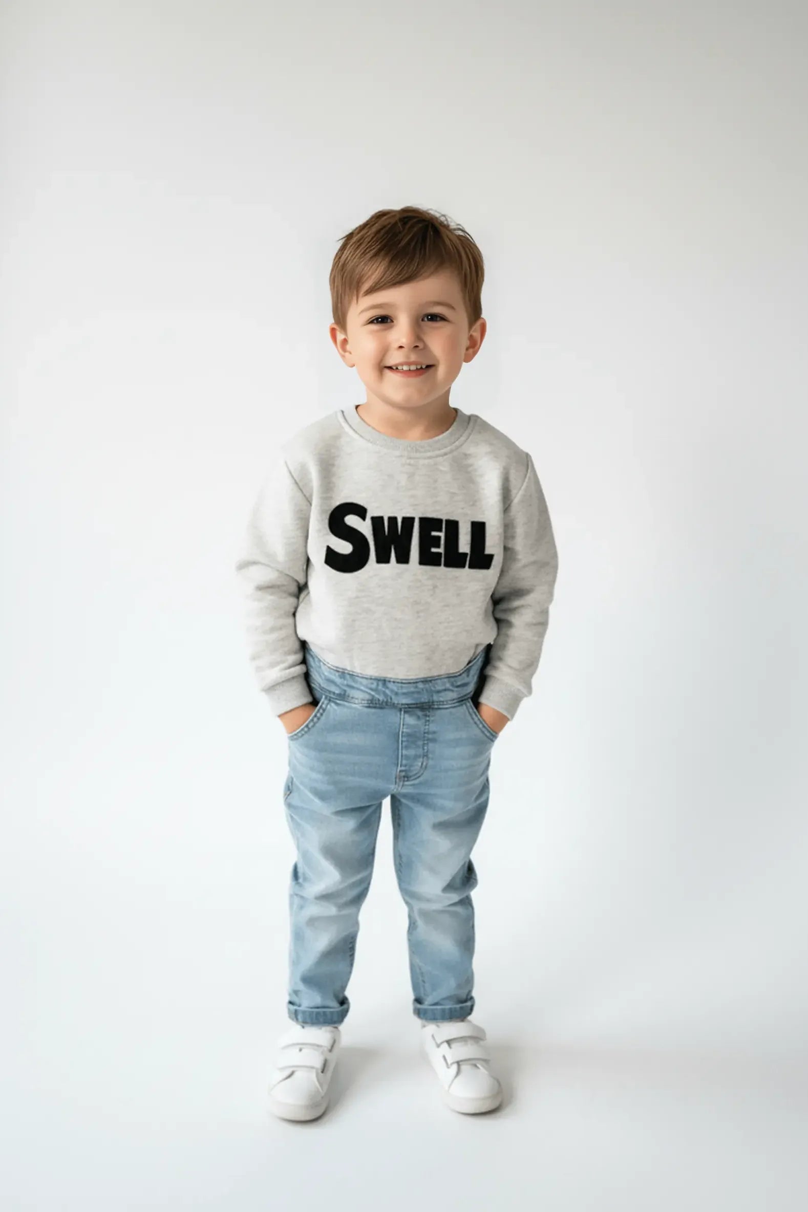 Child wearing a gray Bubba's and Mama's sweatshirt with 'SWELL' text on a white background