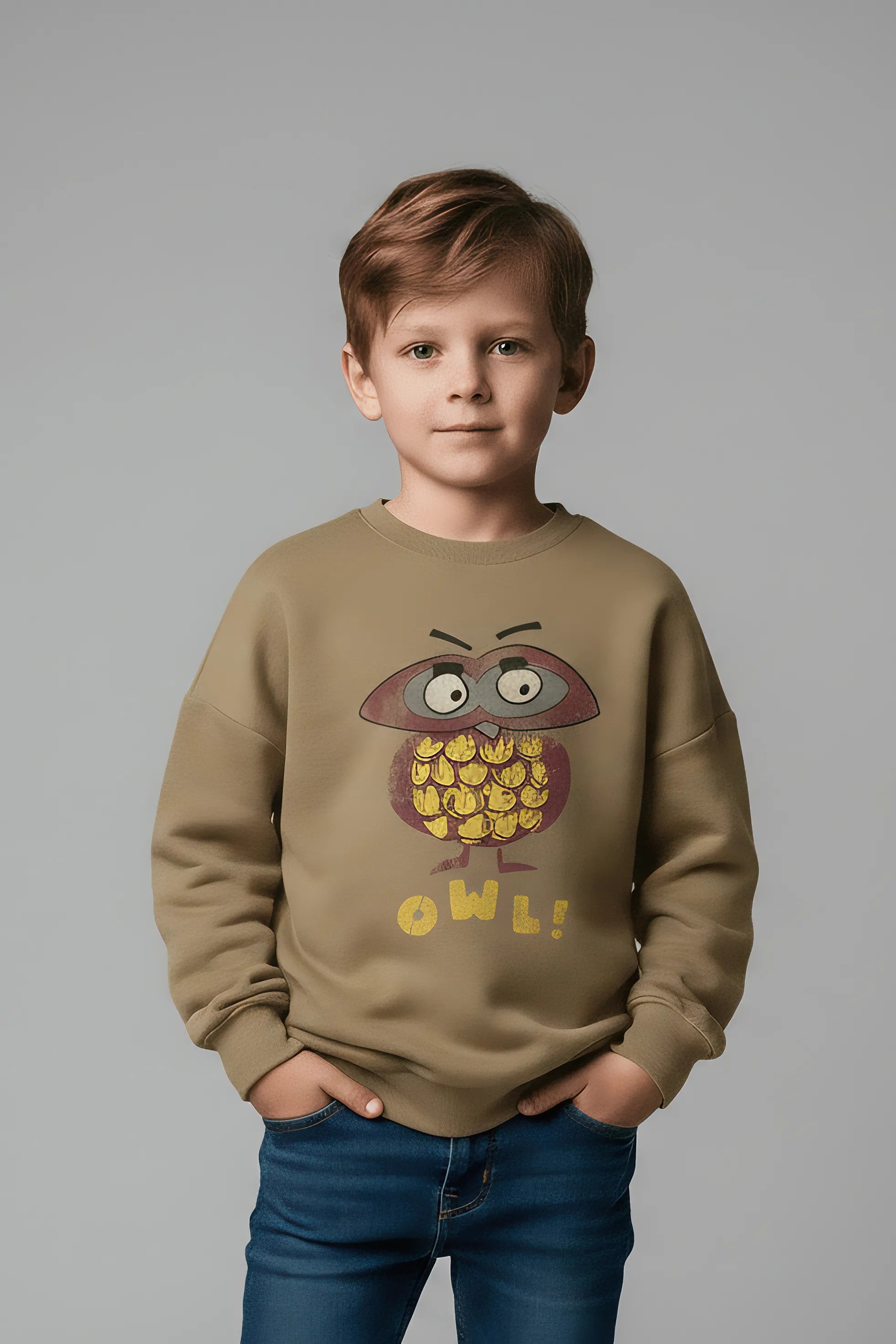 Child wearing a brown Bubba's and Mama's sweatshirt with an owl design on a gray background